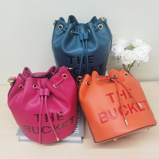 E68-New women's large-capacity handbag solid color letter print crossbody bag drawstring pleated bucket bag